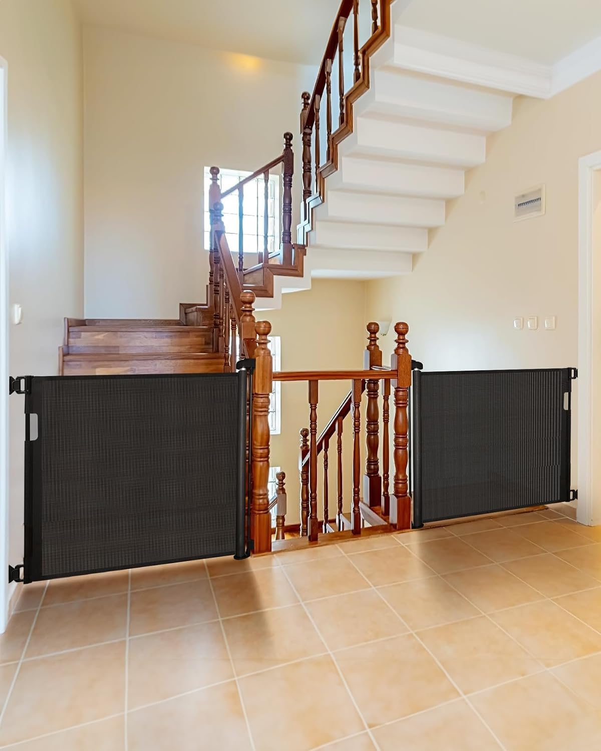 Veraste retractable gate on a stairway shows a tall barrier for stair safety.