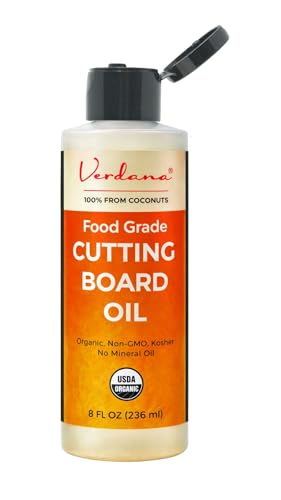 Verdana oil being applied to cutting board—easy absorption without sticky residue.