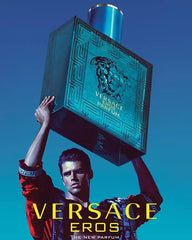 Label detail of Versace Eros Parfum showing ornamental branding.