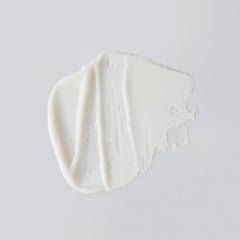 Versed Day Maker microcrystal particles close-up highlighting eco-friendly exfoliation.