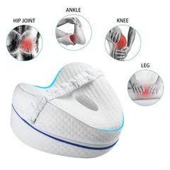 Vertdens leg pillow with white fabric resting on a sofa showcases portability.