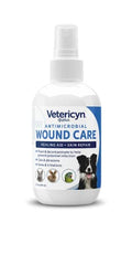 Close-up of Vetericyn Plus bottle used to cleanse a dog wound.