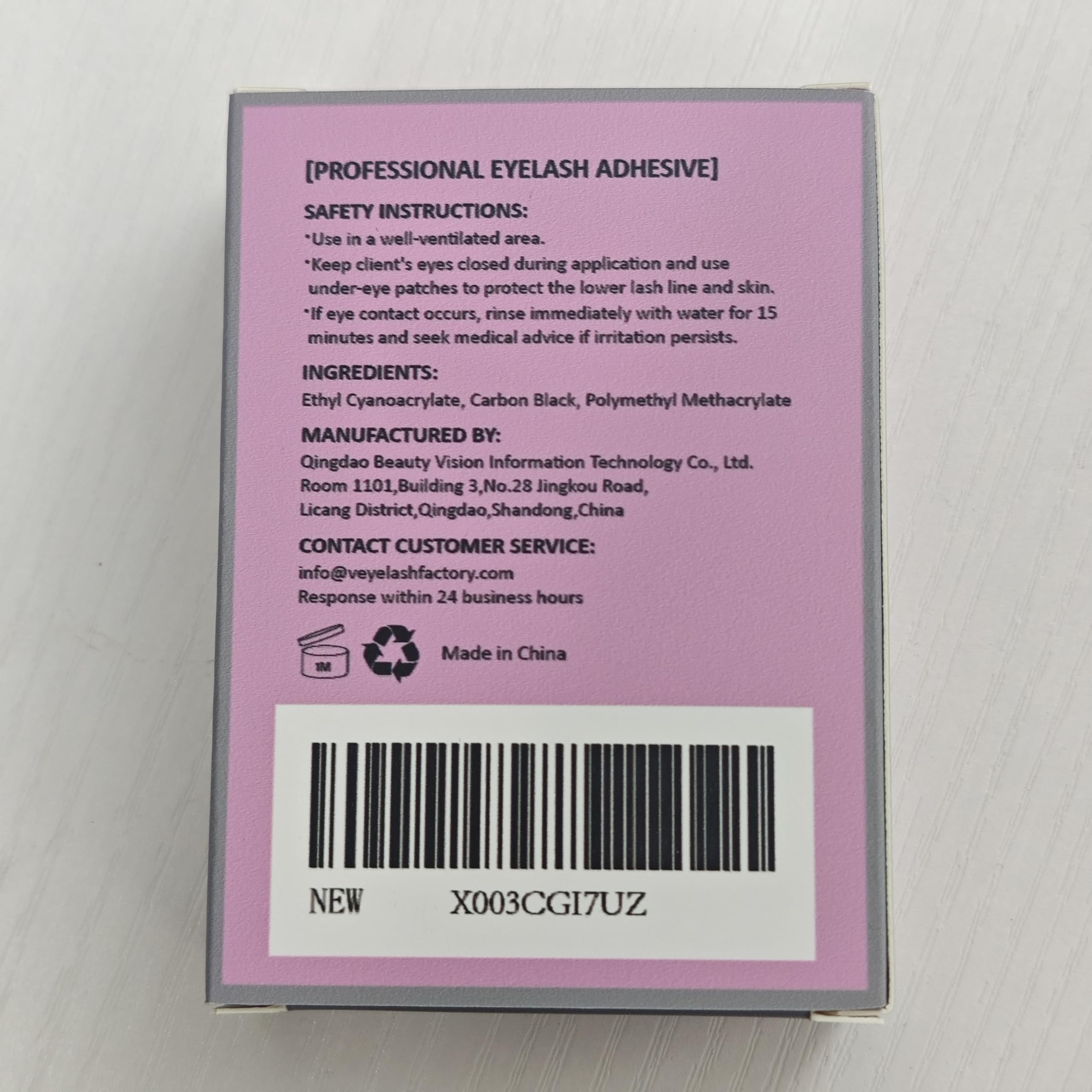 VEYES INC black adhesive bottle blends with lash extensions for seamless finishes.