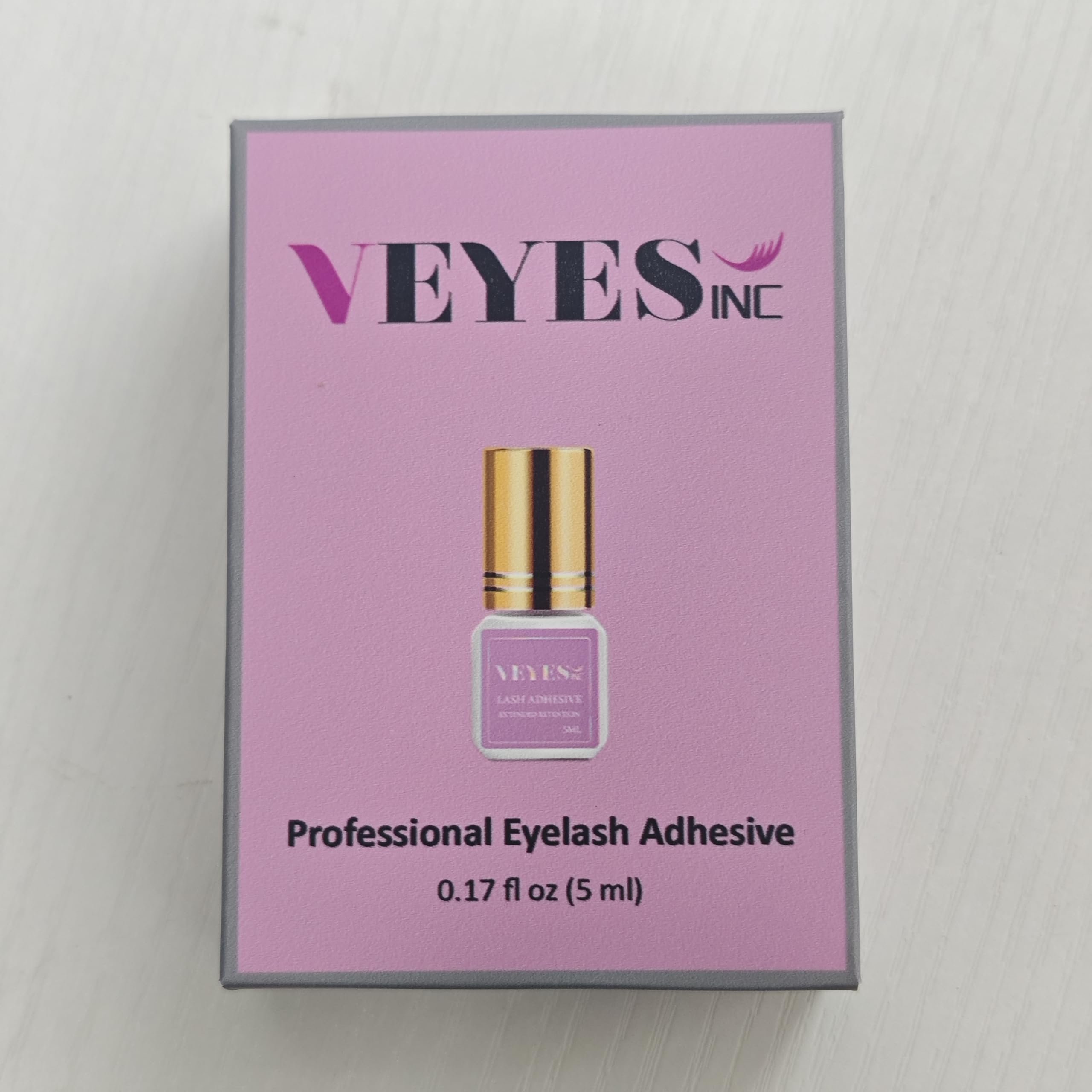 VEYES INC salon-grade glue designed for professional use only.