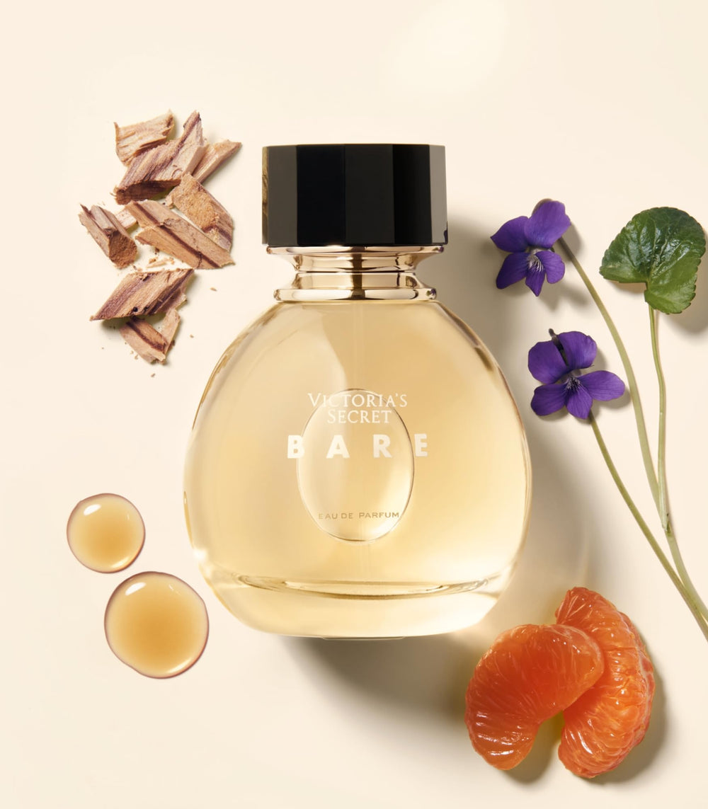 Victoria's Secret Bare notes close-up, highlighting sandalwood, mandarin, and violet for a woody floral vibe.