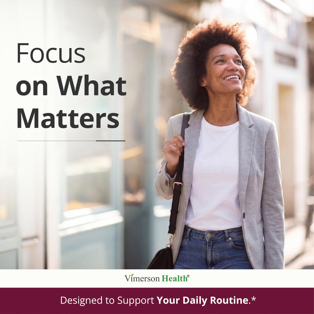 Busy woman taking vitamins with meals for best results