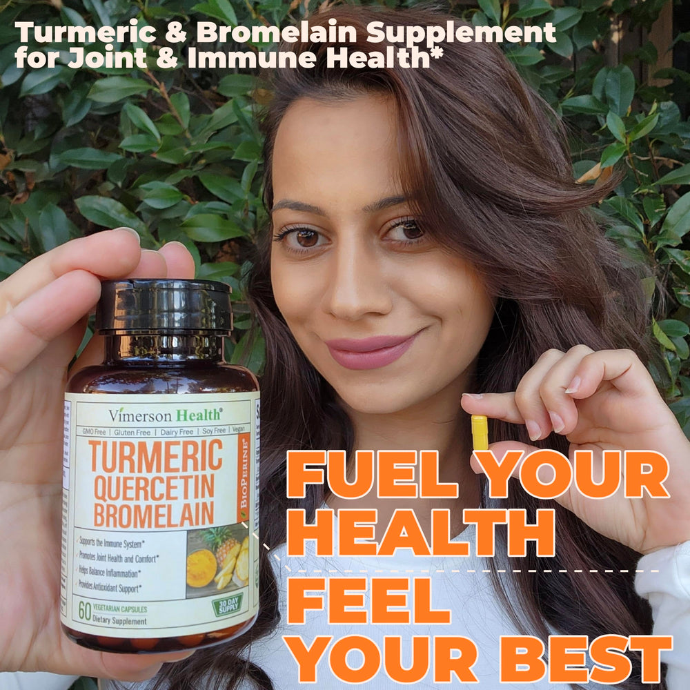 Vimerson Health turmeric roots and capsules arranged for lifestyle shot.