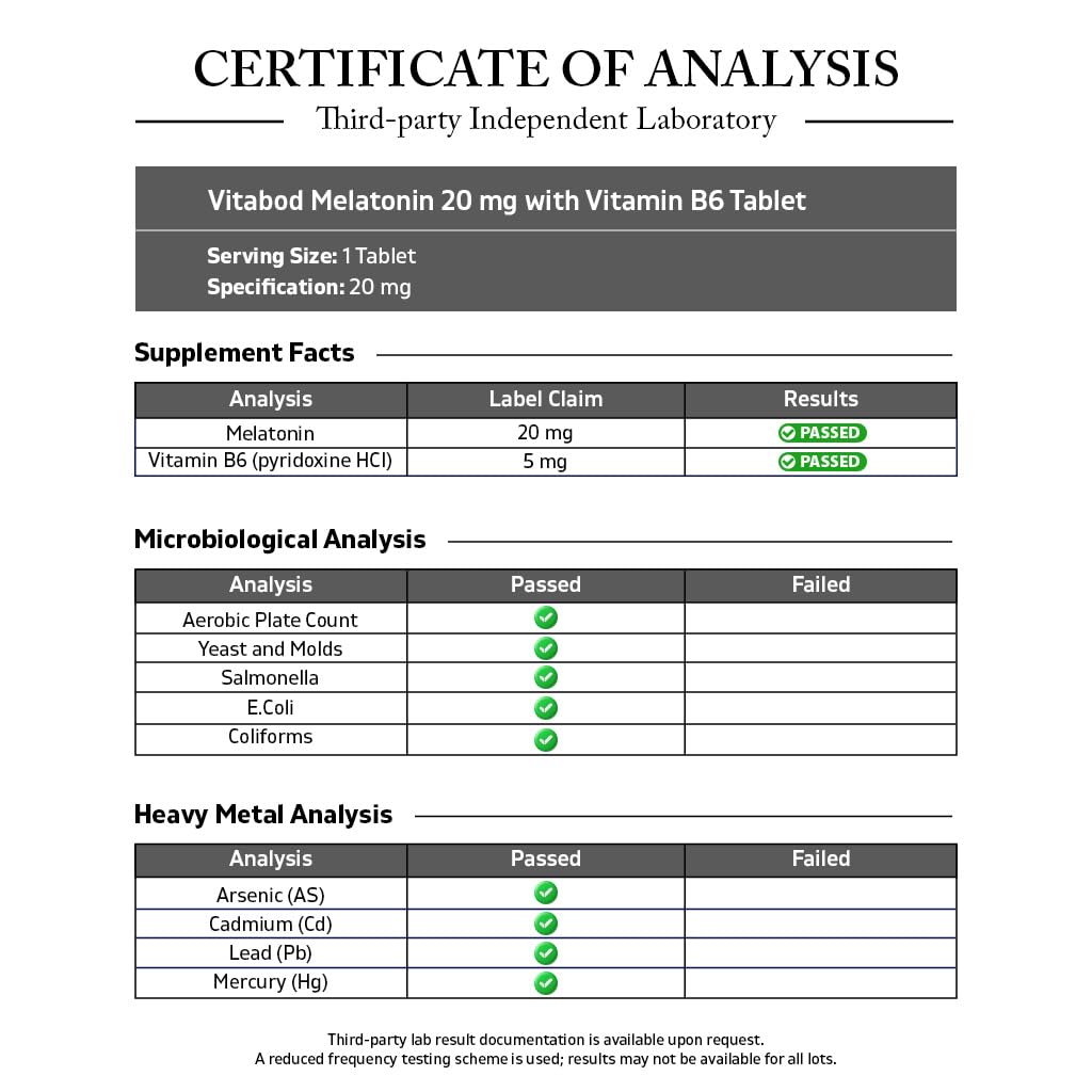 Close-up of a berry-flavored Vitabod tablet dissolving on the tongue