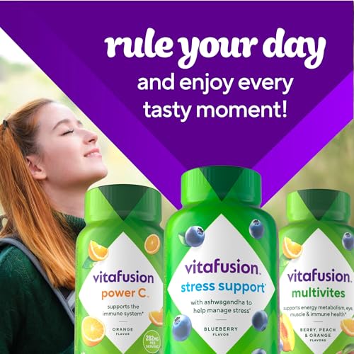 Gummies being poured from Vitafusion bottle into a hand for easy use.