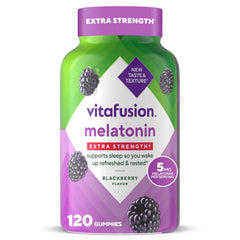 Vitafusion melatonin gummy bottle on nightstand for restful sleep