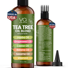 VITAL AFFAIR Tea Tree Oil hair bottle on wood promotes scalp balance.
