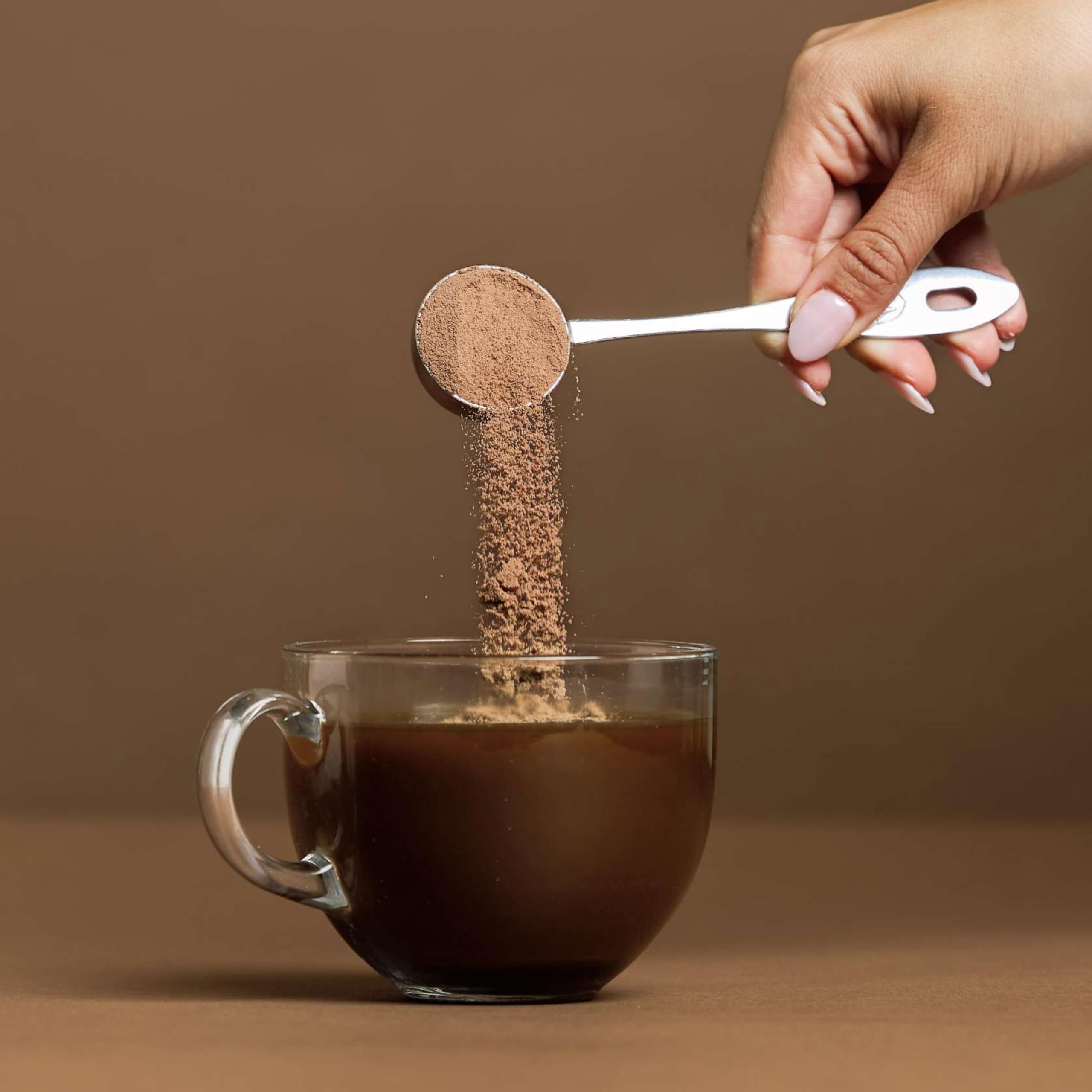 Vital Proteins chocolate-flavored serving ready to blend with a drink.