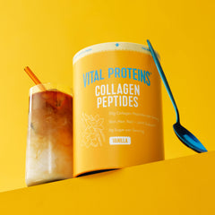 Vital Proteins vanilla collagen scooper beside smoothie for easy mixing