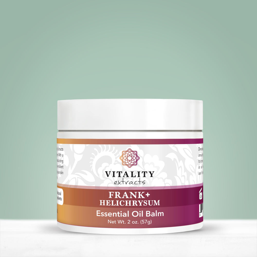 Vitality Frank+ Helichrysum Balm being applied to dry skin with soothing touch