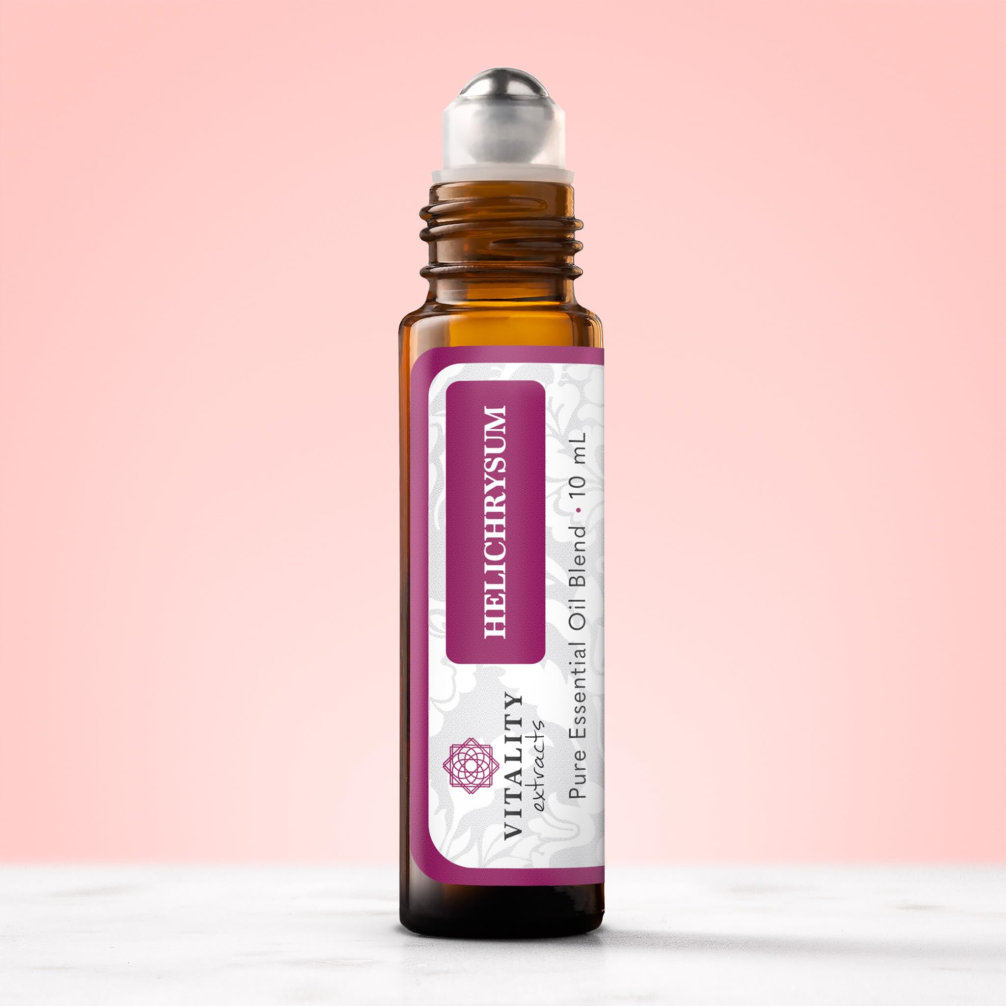Vitality Helichrysum Roll-On applied at temples and wrists for quick use.