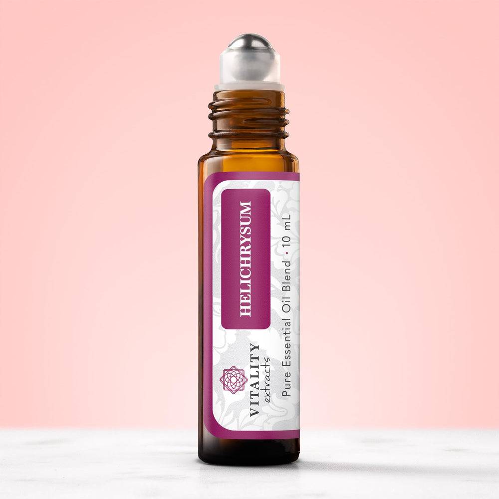 Vitality Helichrysum Roll-On applied at temples and wrists for quick use.
