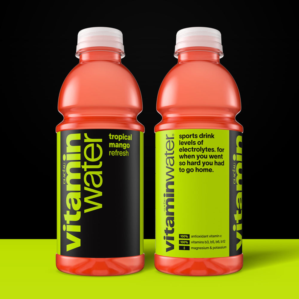 vitaminwater Refresh Tropical Mango pour showcasing bright mango flavor and hydration.