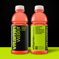 vitaminwater Refresh Tropical Mango pour showcasing bright mango flavor and hydration.