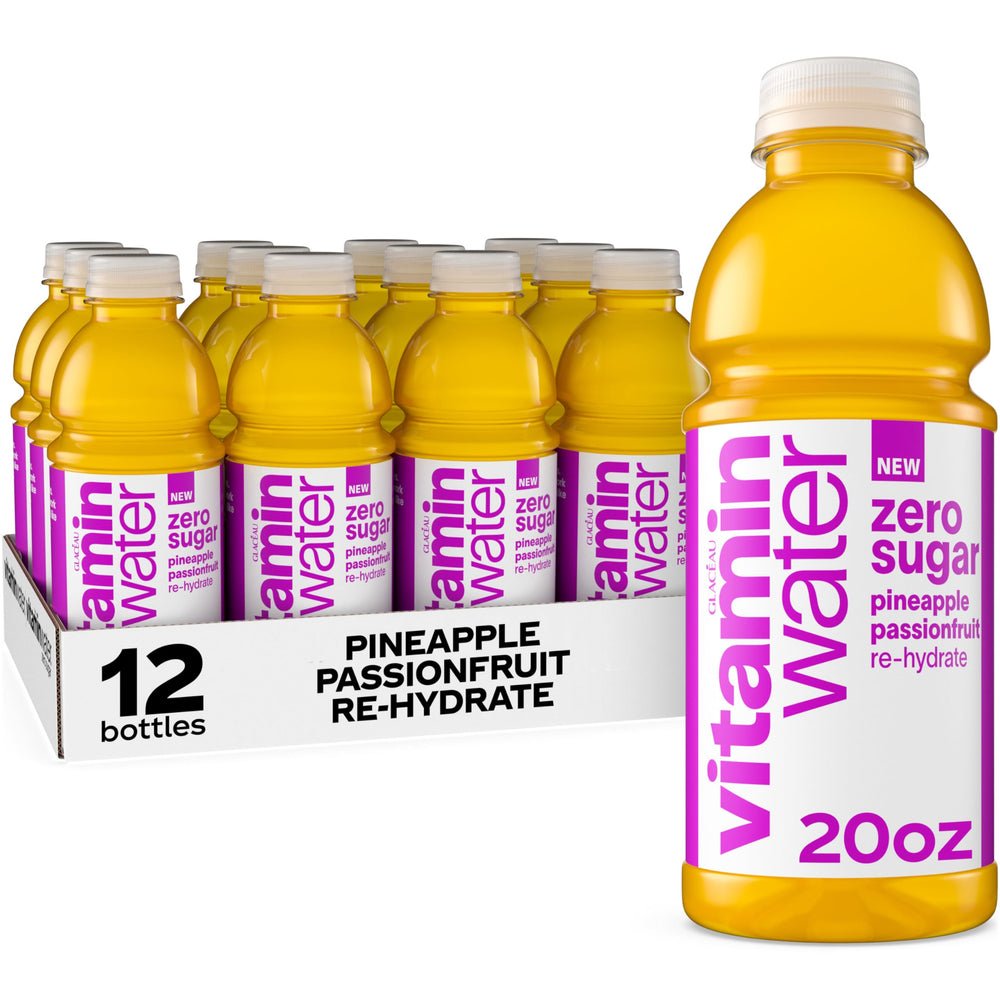 Vitaminwater Zero Sugar Pineapple Passionfruit bottle on desk, convenient hydration for on the go.