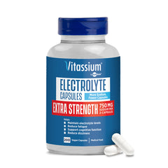 Vitassium electrolyte capsules bottle pour showing portable daily electrolyte support.