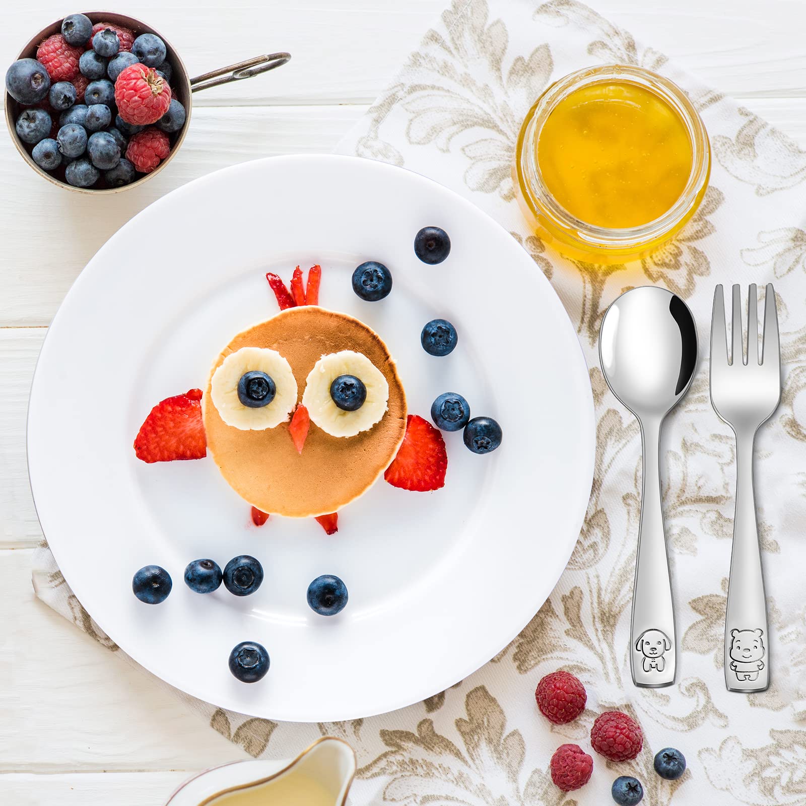 VITEVER embossed animal motif on spoon and fork encourages independent eating.