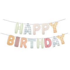 Vrukiaa birthday banner letters in plaid pattern for festive photo backdrop.