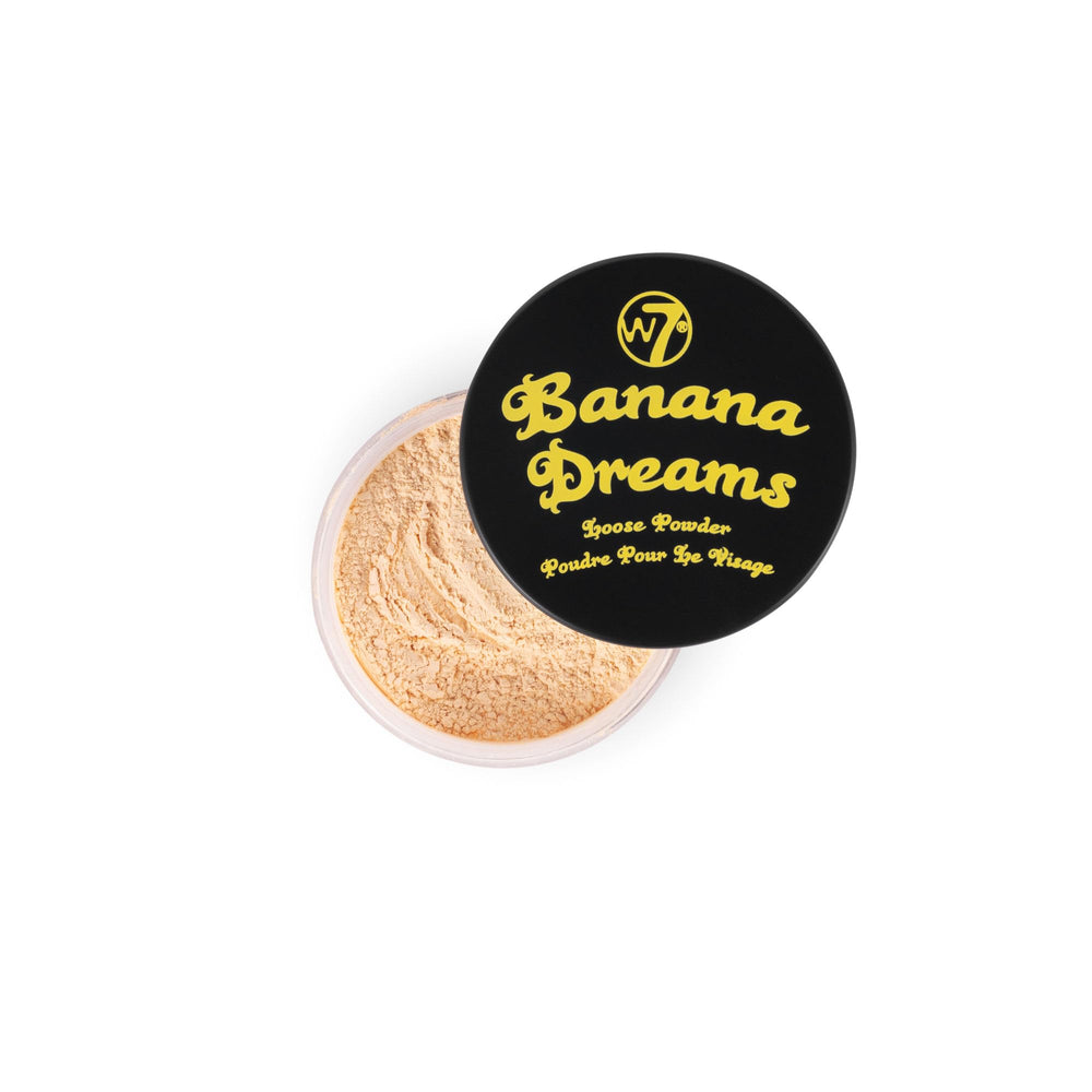 W7 Banana Dreams loose powder jar close-up showing a smooth, lightweight finish.