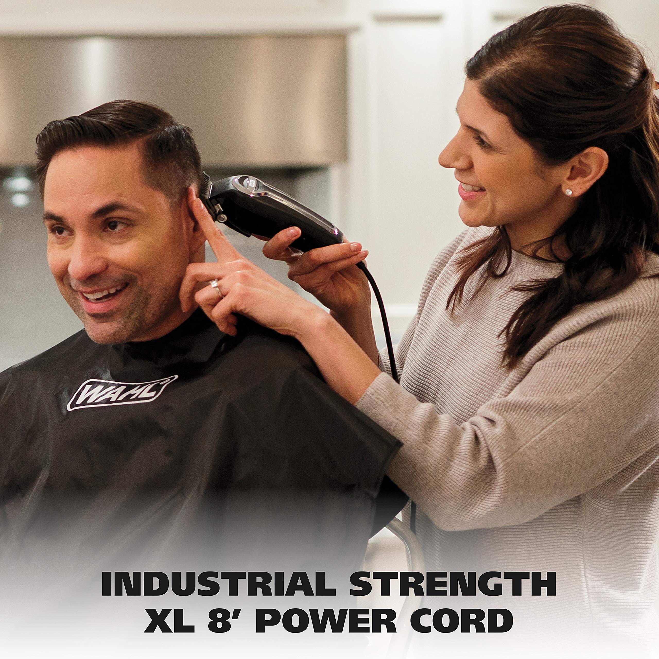 Wahl Elite Pro cleaning brush aids quick maintenance.
