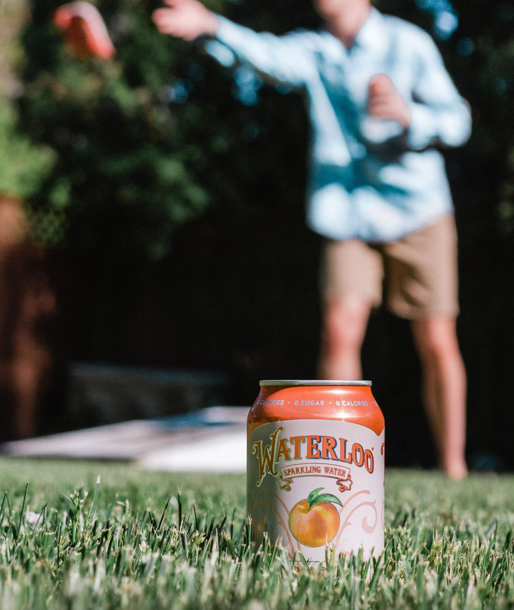 Bubbles rise in Waterloo Peach Sparkling Water, ideal for a crisp break
