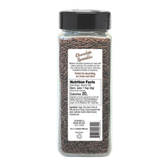 Watkins chocolate sprinkles being poured over dessert for vibrant decoration.