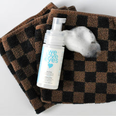 Close-up of foam from We Love Eyes Tea Tree Eyelid Cleanser for lid cleansing.