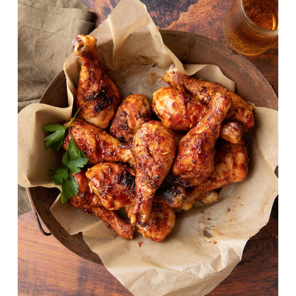 Weber Kick'N Chicken Seasoning in a kitchen scene for grilling inspiration