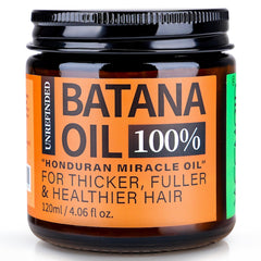 Weemotd Batana oil bottle close-up for scalp nourishment.