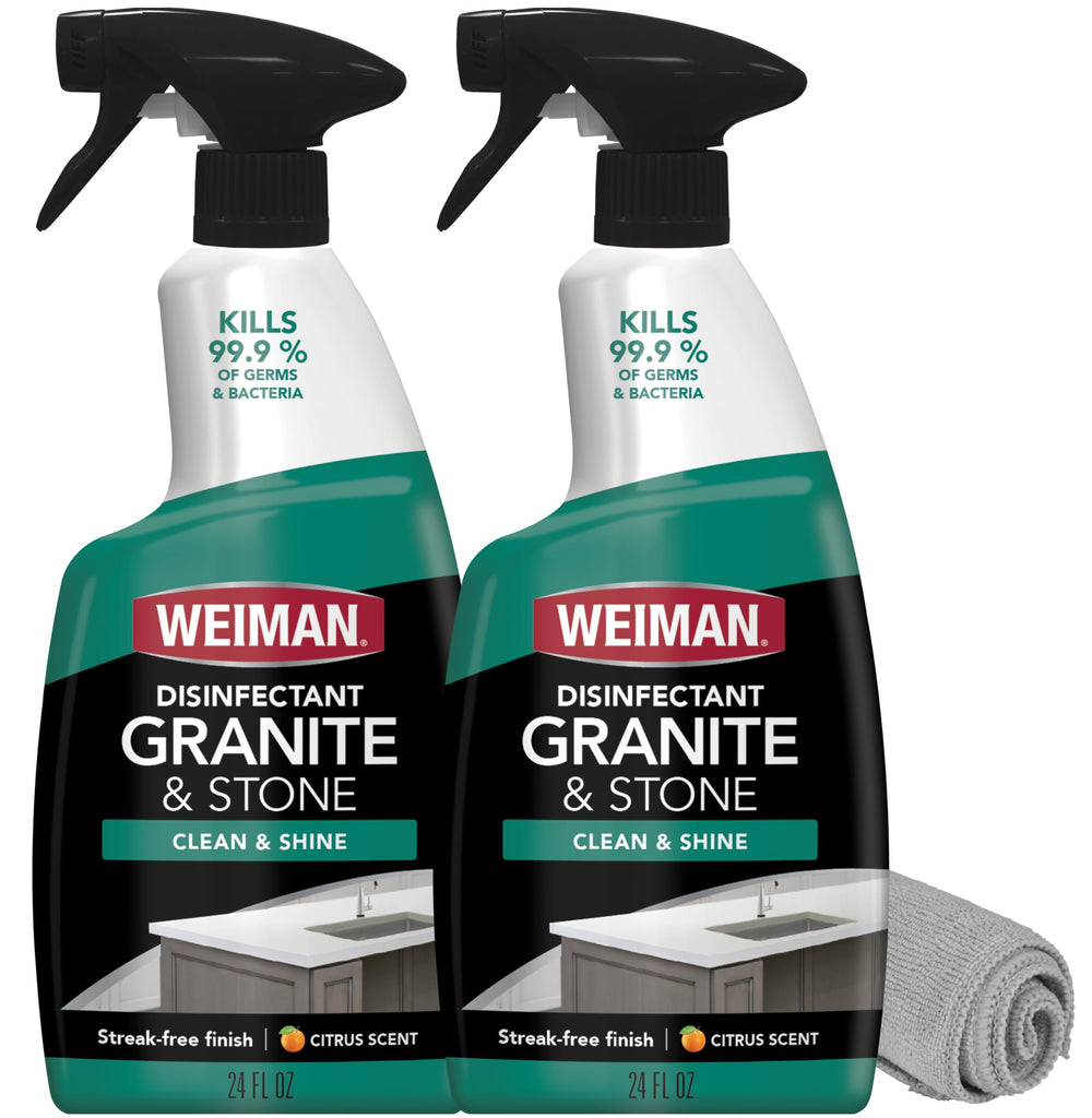 Weiman Granite Daily Clean & Shine bottle pour disinfecting a granite counter