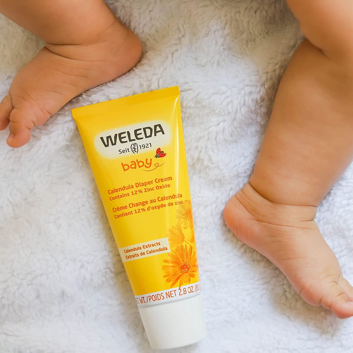 Creamy, non-greasy texture of Weleda diaper cream close-up.