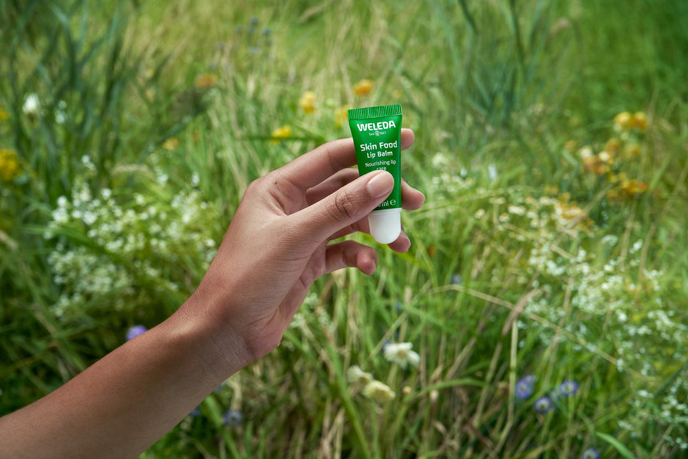 Weleda Lip Butter on dry lips providing soothing moisture