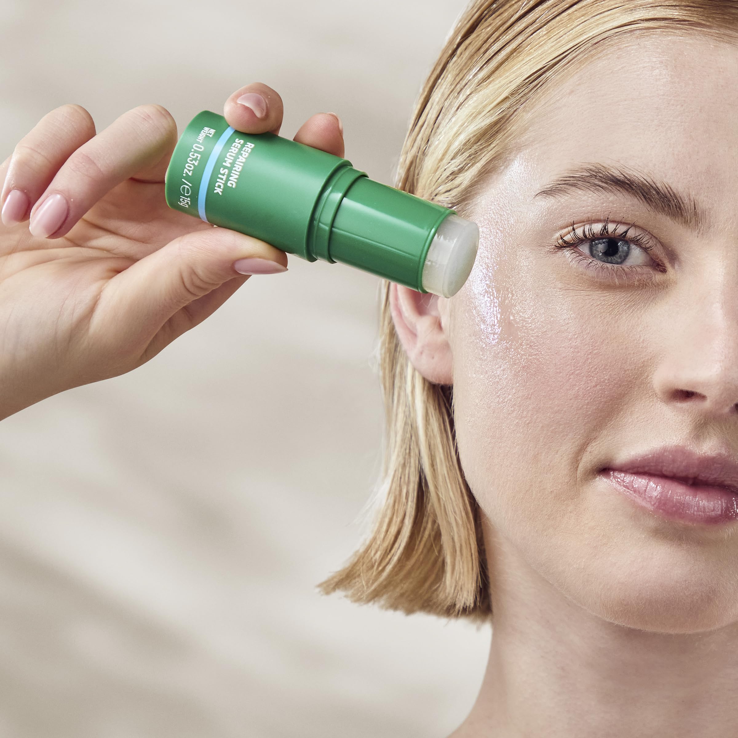 Weleda Skin Food Serum Stick applied on the face for daily hydration.
