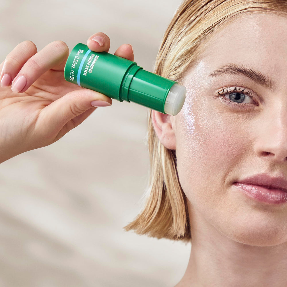 Weleda Skin Food Serum Stick applied on the face for daily hydration.