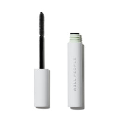 Well People Expressionist Mascara brush close-up showing precise lengthening and even coverage.