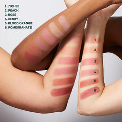 Applying Well People Supernatural Stick on cheeks and lips for multi-use color.