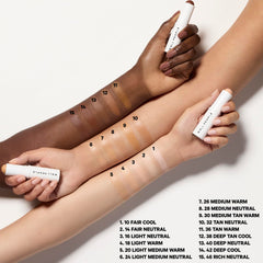 Application on face of Well People Supernatural Stick for spot coverage and blend.