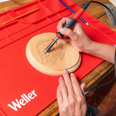 Weller heat deflector protects hands during detail work.