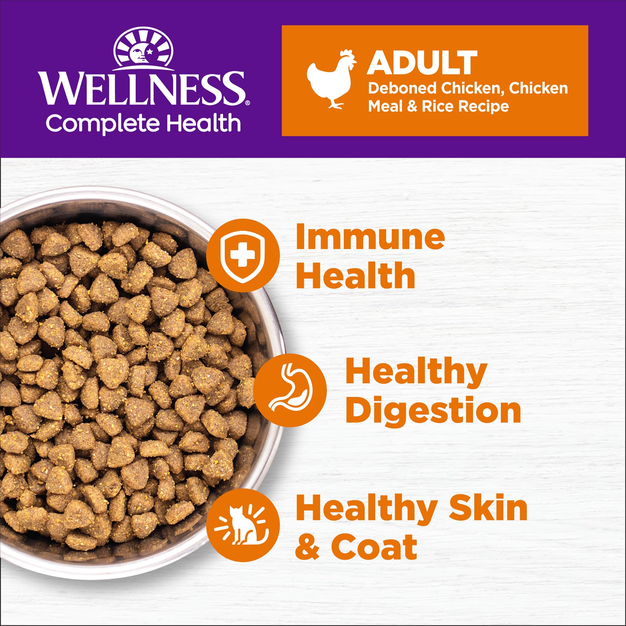 Wellness Complete Health dry kibble close-up showing real chicken flavor for adult cats.