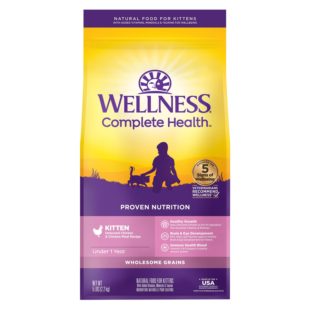 Wellness kitten dry food kibble closeup shows high-quality protein for growing kittens.