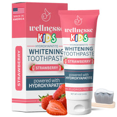 Wellnesse hydroxyapatite toothpaste for kids with strawberry flavor in a tube for enamel-friendly brushing