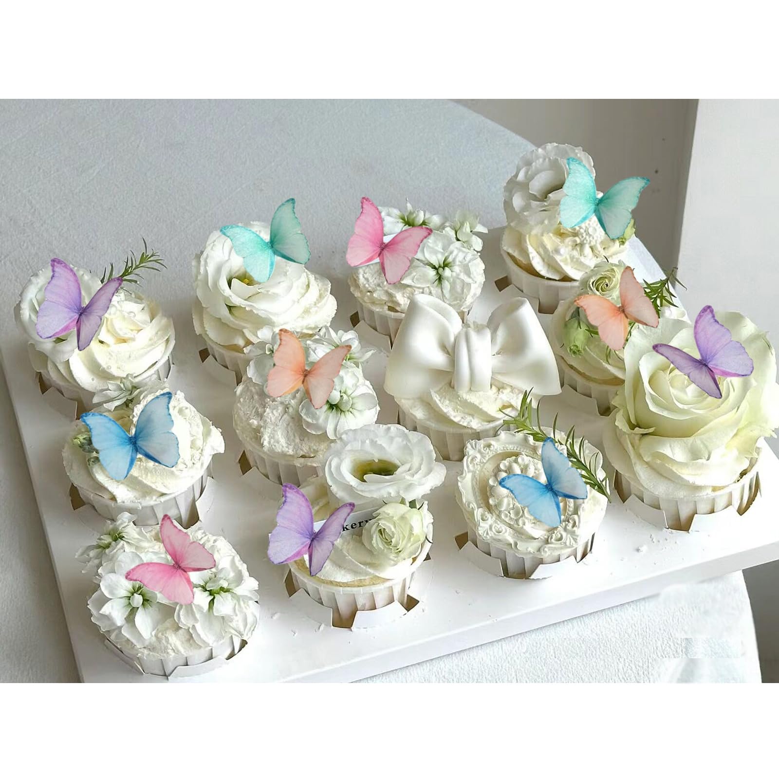 Weraru edible wafer butterfly cupcake topper in mixed colors for festive decorations.