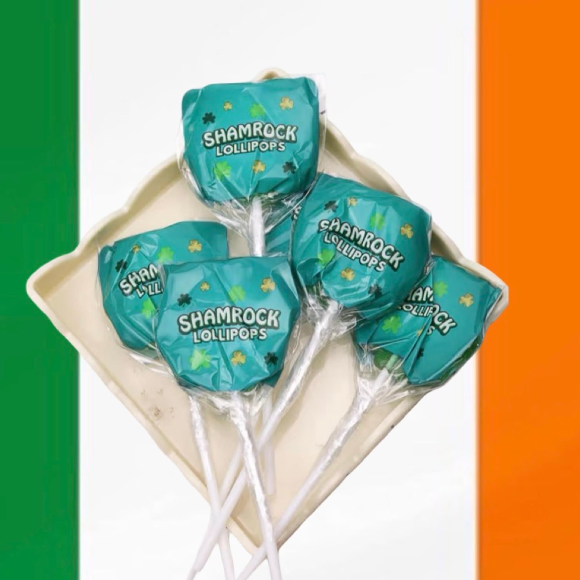 Westmon Works Shamrock Lollipops in a candy bowl display.