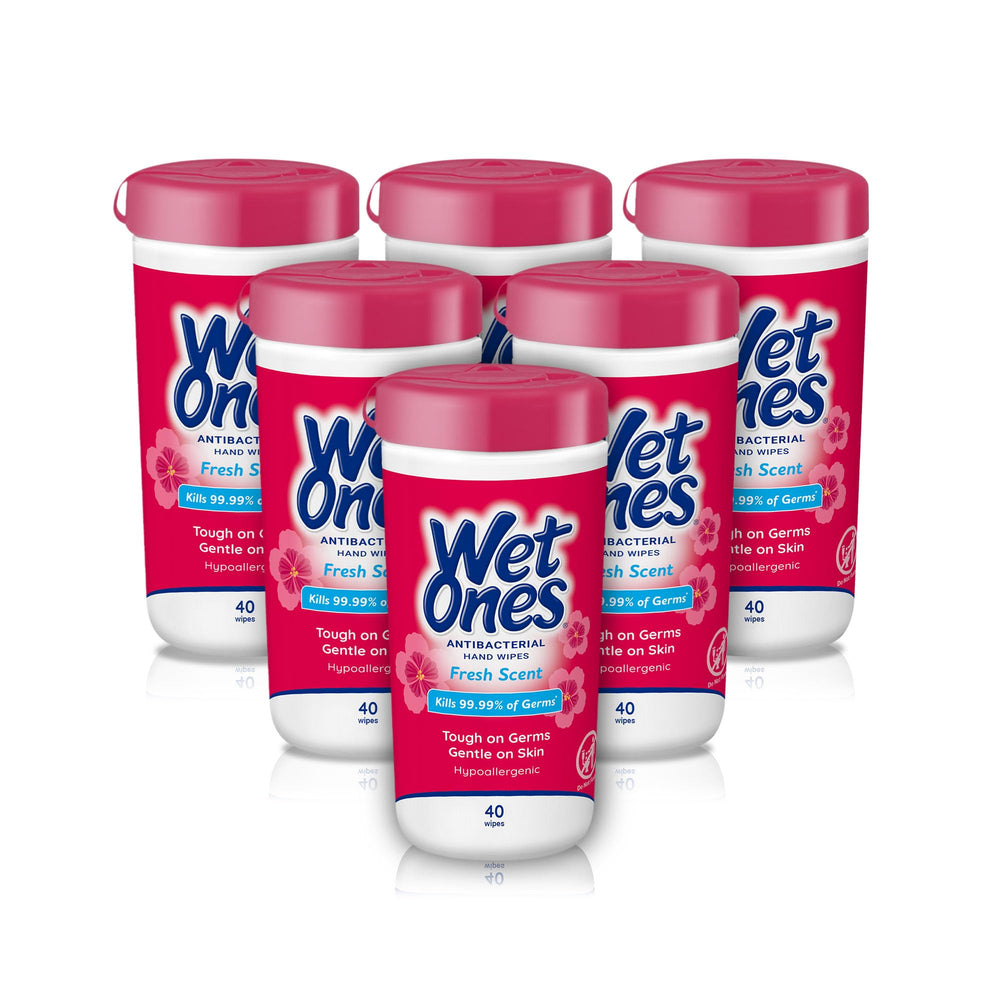 Wet Ones Fresh Scent wipes in a canister closeup for easy germ defense at home.
