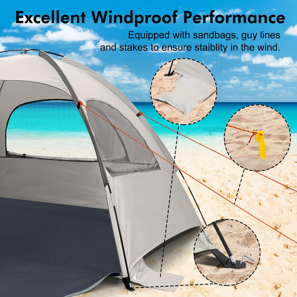 WhiteFang Beach Tent includes sandbags, stakes, and guy lines for secure setup.