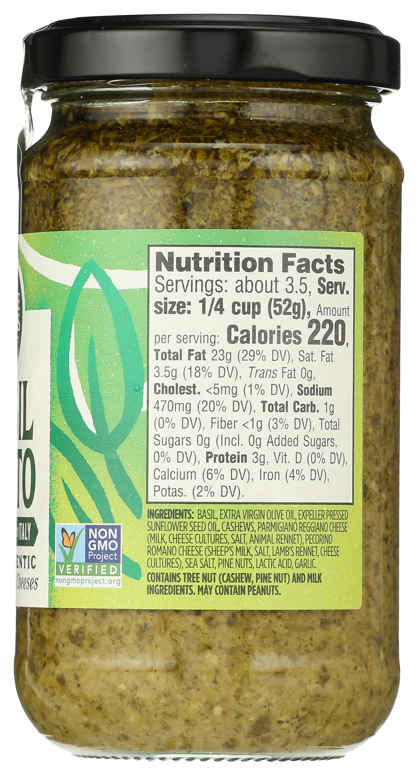 Close-up of Whole Foods Market Basil Pesto ingredients and authentic Italian cheeses.